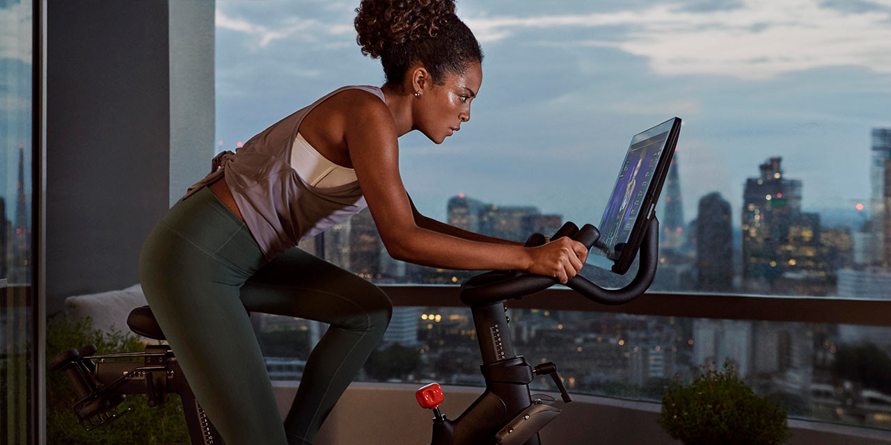 at-home cycling woman